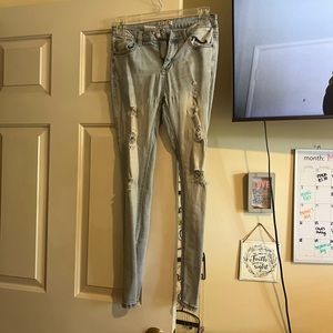 Gently worn light wash holy jeans